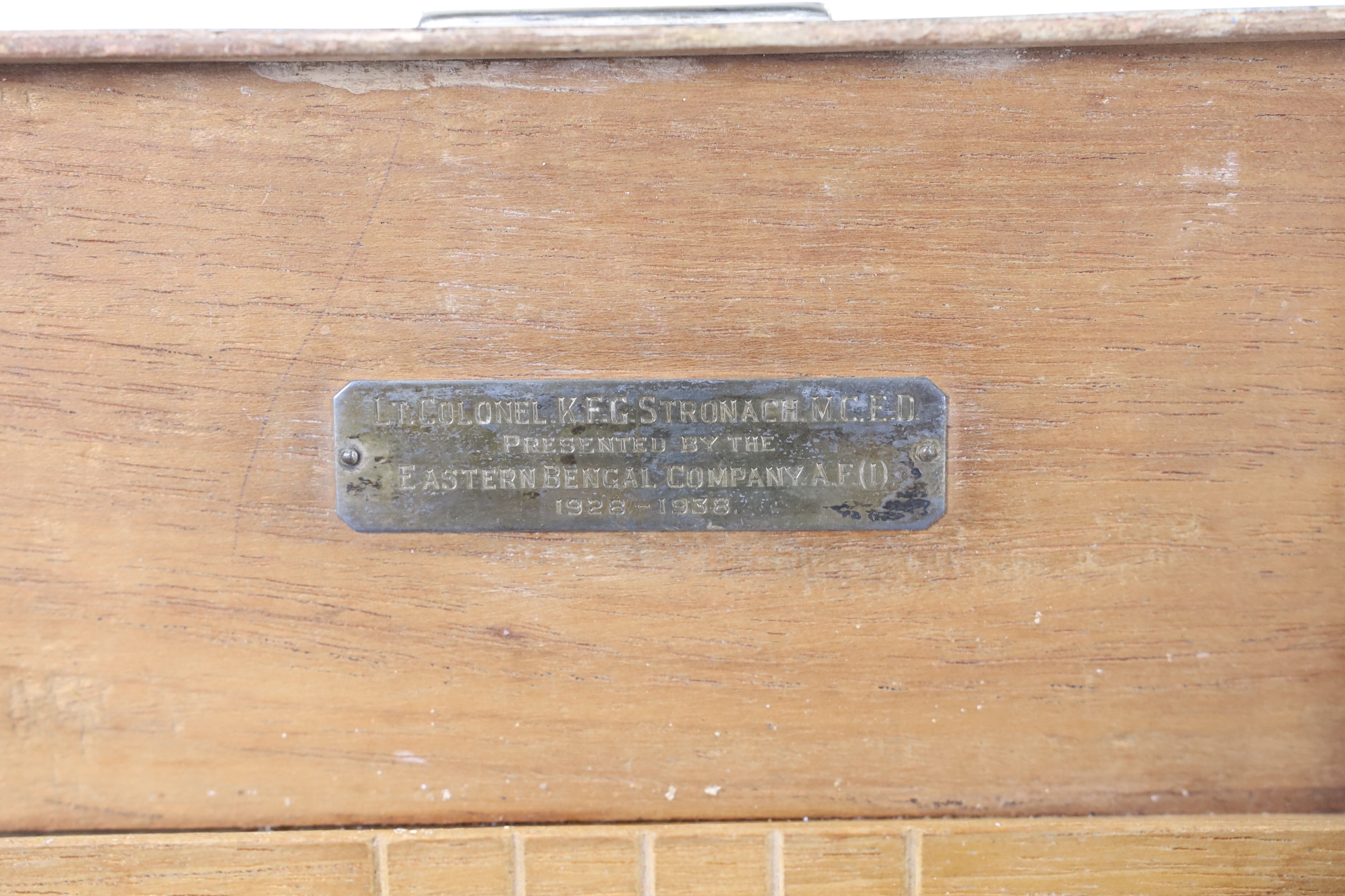 A George VI part engine tuned silver mounted rectangular cigarette box, with white metal crocodile surmount and interior presentation inscription relating to 'Lt. Colonel K.F.G. Stronach', maker Hamilton & Co, London, 19